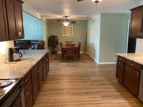 Kitchen looking at dining room table.