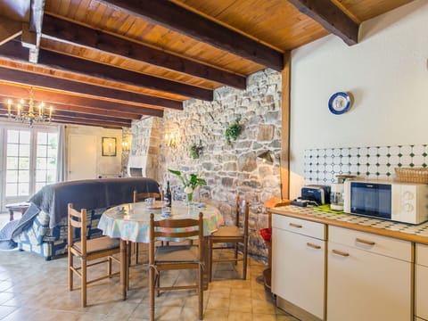 Table, Property, Furniture, Cabinetry, Countertop, Wood, Interior Design, Lighting, Kitchen Appliance, Architecture