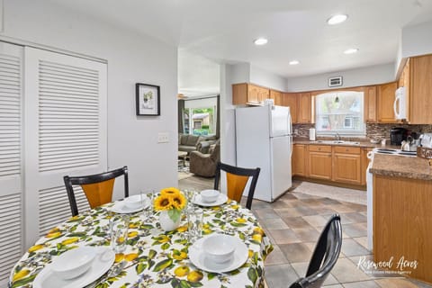 Eat in kitchen with four chairs extra chairs in closet
