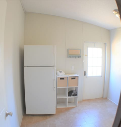 Extra fridge. May contain some things of owners but still can be used.