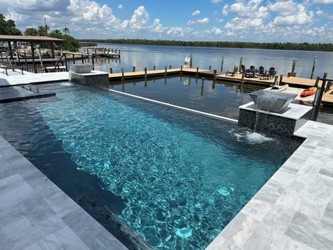 Private infinity edge pool with spa.
