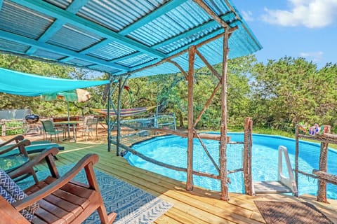 Covered deck with above ground swimming pool
