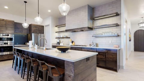 Expansive kitchen with ample counter space for food prep