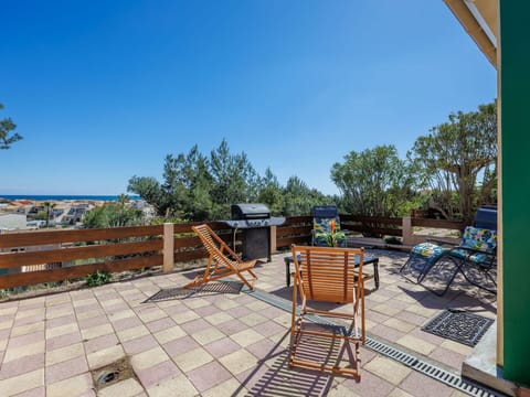 Sky, Property, Building, Wood, Shade, Outdoor Furniture, Plant, Chair, Tree, Leisure