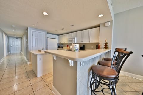Kitchen with breakfast bar connected