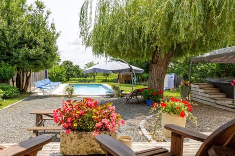 Hot tub and a heated pool with vineyard views