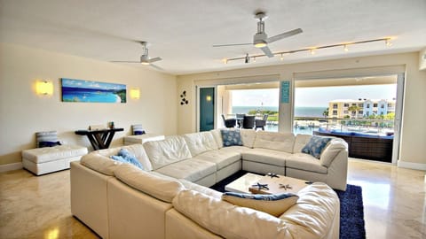 Living Room with Large Sliders to Balcony