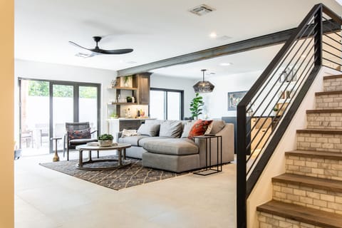 Stairs to the right lead to the master suite