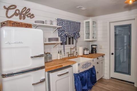Farmhouse kitchen with fun retro appliances, refrigerator, professional grade gas stove top and oven from Italy, dishwasher, drip coffee maker and much more.