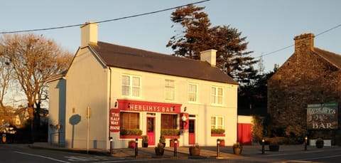 Exterior with parking area to rear