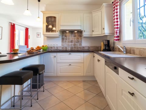 Cabinetry, Countertop, Furniture, Property, Kitchen, Wood, Drawer, Sink, Window, Lighting