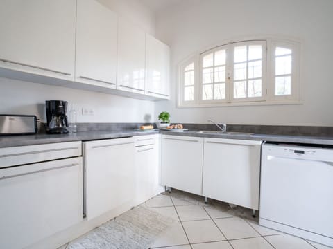 Cabinetry, Property, Countertop, Kitchen Stove, Sink, Kitchen Sink, Kitchen Appliance, Window, Kitchen, Lighting