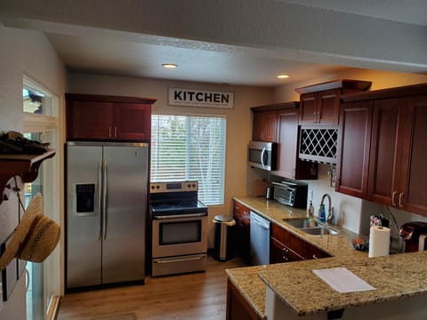 Full Kitchen with Stainless Steel Appliances, Granite Counter Tops, Tall Cabinet