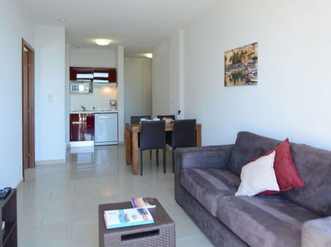 Furniture, Property, Couch, Table, Interior Design, Comfort, Studio Couch, Wood, Floor, Picture Frame