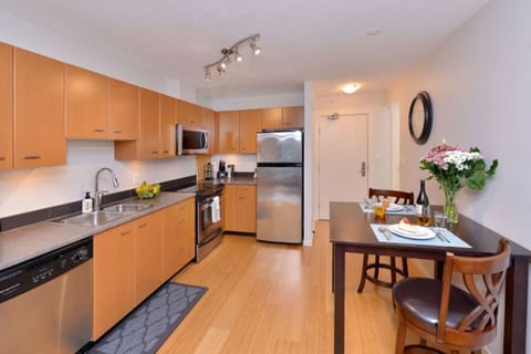 Galley kitchen, with place settings for 6. 