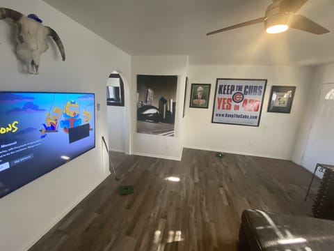 Front Room is spacious with large L-shaped couch. Great for watching movies!