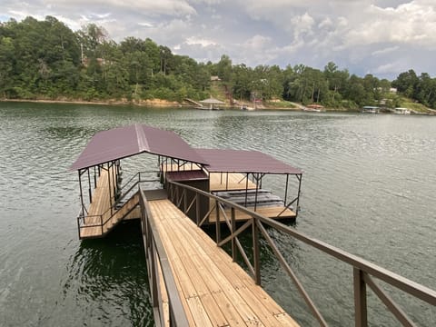 10' x 28' Boat Slip; 2 Jet Ski Ports; Swim Pier w/ Ladder.  Located in Cove.