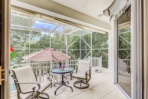 Lanai off the kitchen and living room via sliding doors.  Enjoy a glass of wine without the bugs.