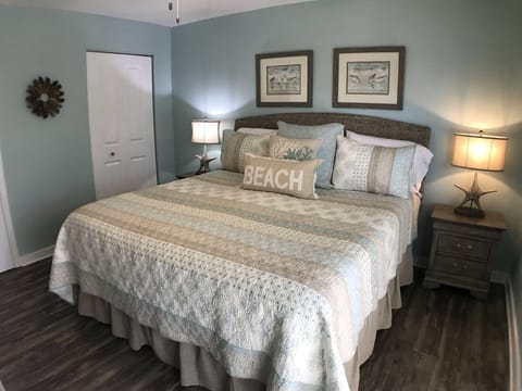 Relax in shades of aqua/sand and memory foam mattress in king master BR