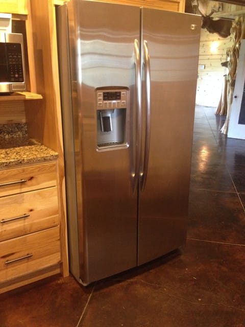 Inside fridge. Another full-size fridge is on the outdoor patio.