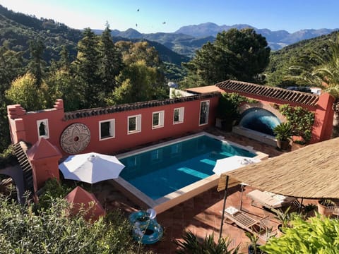 The swimming pool courtyard and surrounding countryside