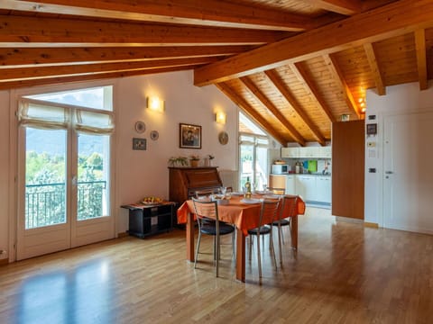 Furniture, Table, Wood, Interior Design, Building, Flooring, Hall, Floor, Wood Stain, Living Room