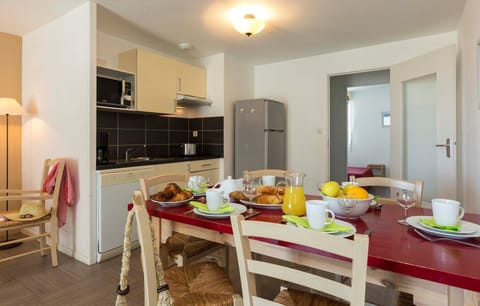 Enjoy a delicious homemade meal in the dining area with seating for your group.