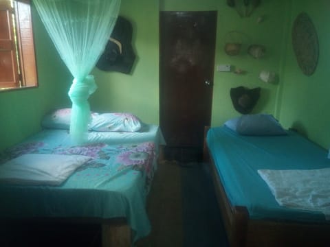 BED ROOM PHOTO OF HE MANGO TREE ROOM