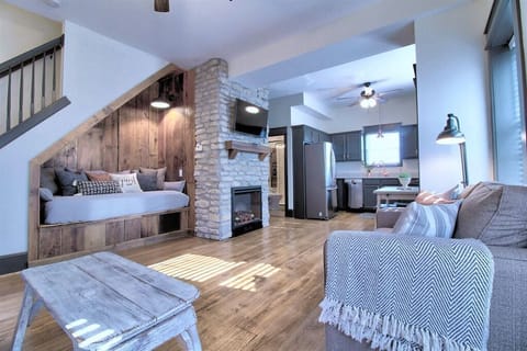 Large open floor plan between kitchen and living room for gathering. 