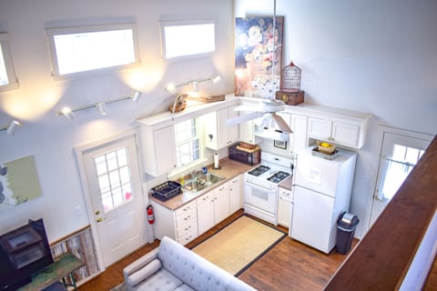 View of full kitchen from upstairs loft