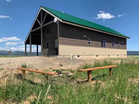 Fire pit with benches just off the back patio