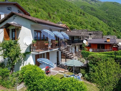 Furniture, Building, Table, Plant, Chair, Houseplant, Shade, Orange, Interior Design, Flooring