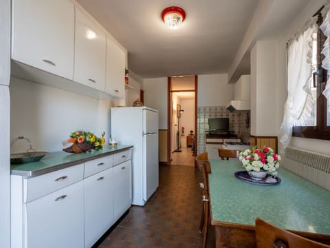 Furniture, Building, Table, Plant, Chair, Houseplant, Shade, Orange, Interior Design, Flooring