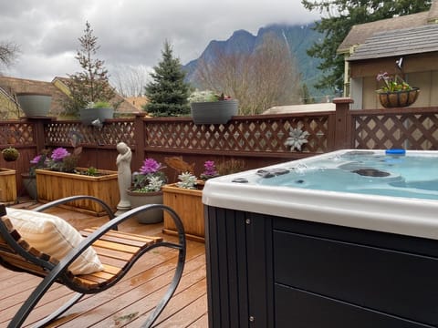 Mt Si and cottage hot tub.  Suite behind fence.