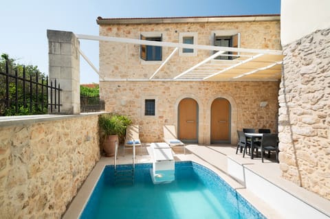 Stone facade from patio-pool area.