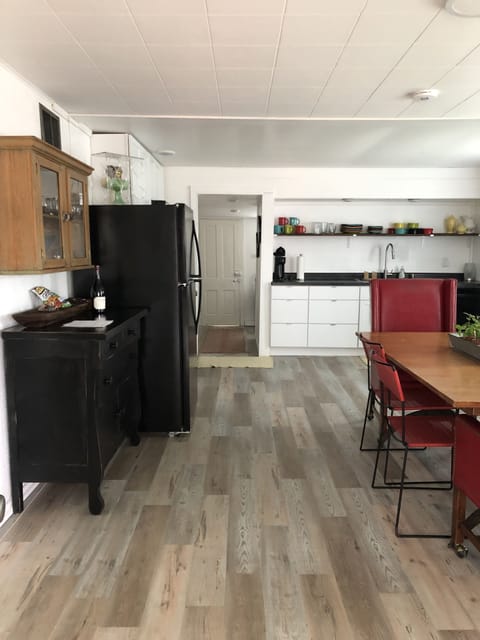 Looking into the dining/kitchen from the French doors.
