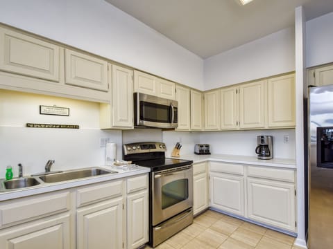 Fully Equipped Kitchen with Stainless Steel Appliances