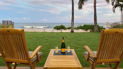 Enjoy the deck and backyard.  The beach is 40 ft from the deck.
