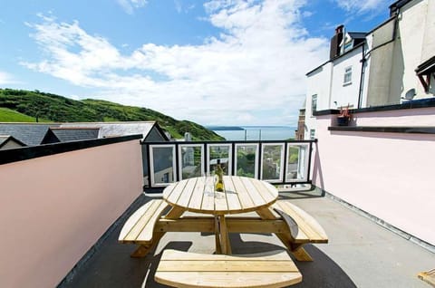 sunny roof terrace with sea views