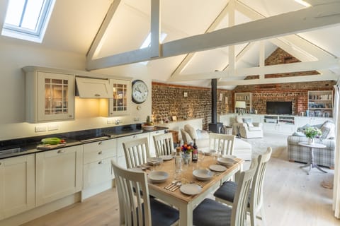 Summer Barn, Weybourne: A view across the vaulted living area