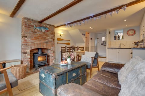 Albert's Cottage (2), Wells-next-the-Sea: Open plan living area with interesting furnishings