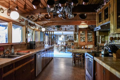 Dine-in country kitchen, galley style leading into the dining area.