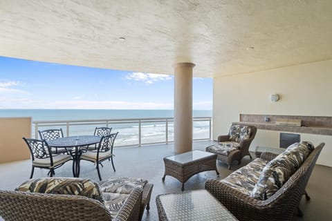 Spacious oceanfront patio with stunning sea views and cozy seating