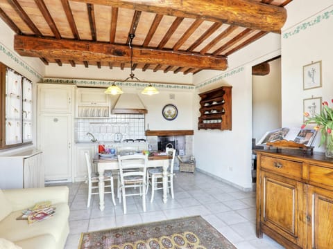 Furniture, Cabinetry, Picture Frame, Window, Table, Plant, Wood, Kitchen, Houseplant, Couch