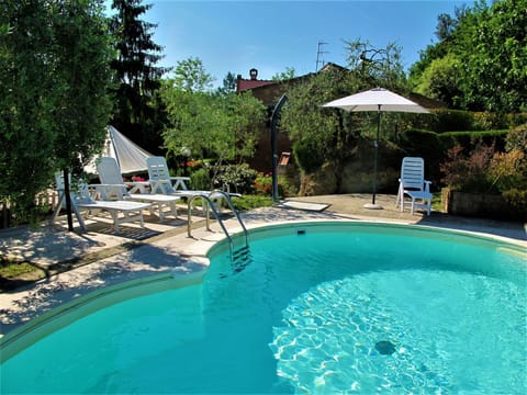 Water, Plant, Property, Swimming Pool, Umbrella, Sky, Azure, Tree, Shade, Outdoor Furniture