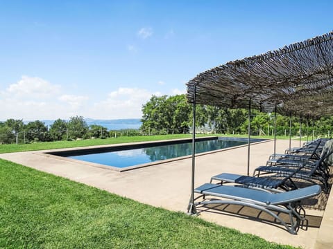 Water, Sky, Plant, Swimming Pool, Cloud, Outdoor Furniture, Shade, Grass, Leisure, Tree