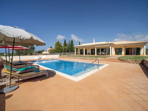 Sky, Water, Cloud, Swimming Pool, Azure, Plant, Building, Shade, Outdoor Furniture, Real Estate