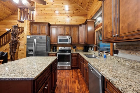 Spacious, fully stocked kitchen.