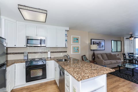 Full kitchen with stainless steel appliances