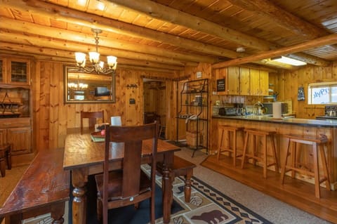 This home has so much seating at the dining table with additional chairs you can pull in and more seating at the counter.